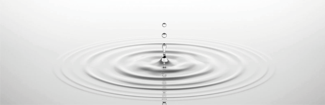 Water droplet creating ripples